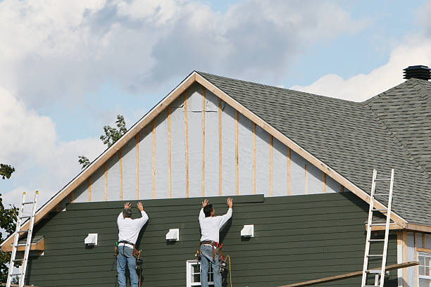 Professional Siding technician working in Rising Sun, IN